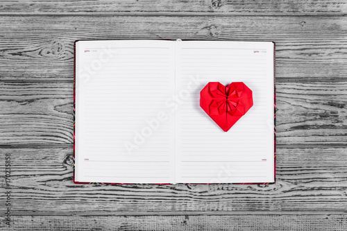Heart Of Origami Of Red Paper Open Notebook With Clean
