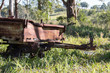 Old rusty trailer abandoned on farm