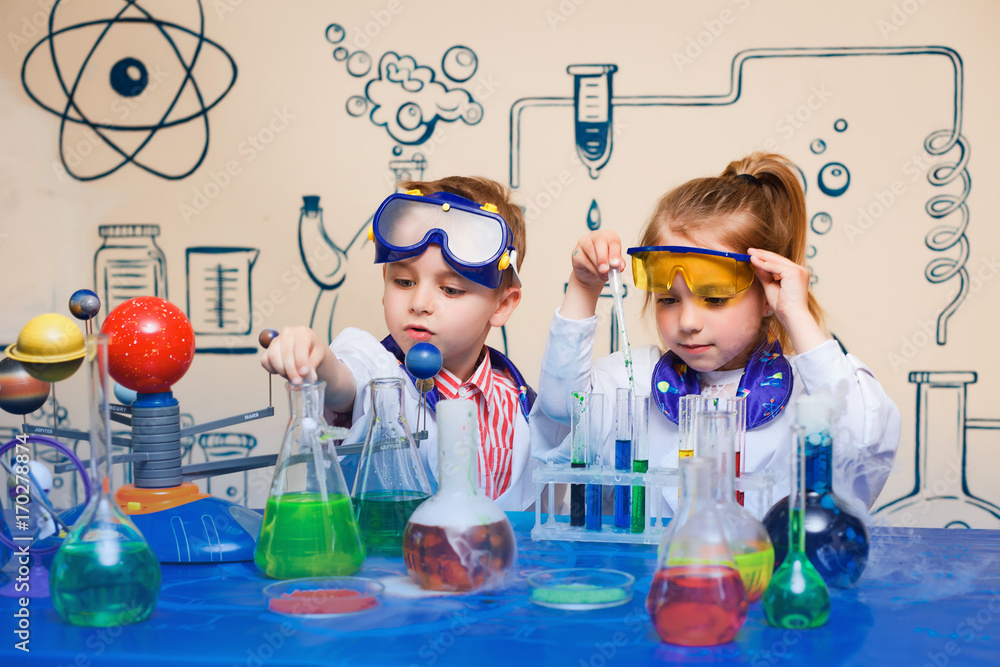 small children do chemical experiments. cheerful science, - obrazy, fototapety, plakaty 