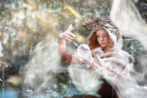 Cuadros en Lienzo Red-haired witch in a dense forest