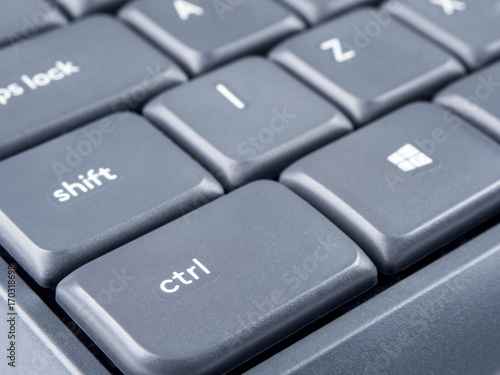 Fényképezés Gray keyboard with focus on Strl and Shift buttons and soft focus on back