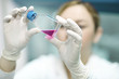 © Lumi Images - Scientist examining liquid in laboratory