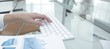 © ASDF - close-up of financial charts and computer keyboard on the desktop
