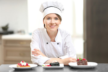 Sticker - Female chef with tasty desserts in kitchen