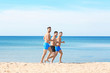 © Africa Studio - Handsome young men running along sea beach