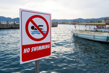 Warning Sign, "No Swimming". Turkish Quay In The City Of Marmaris