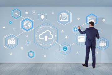 Poster - Businessman using cloud interface on a wall 3D rendering
