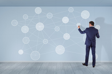Poster - Businessman using social network interface on a wall 3D rendering