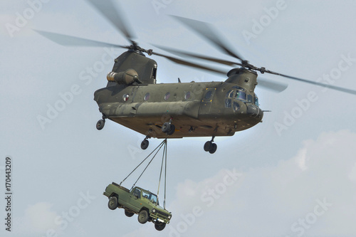Tela Chinook helicopter carrying a jeep