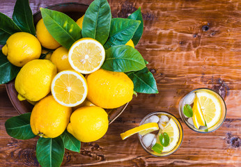 Wall Mural - Lemonade with slices of lemon and mint.Healthy detox drink.