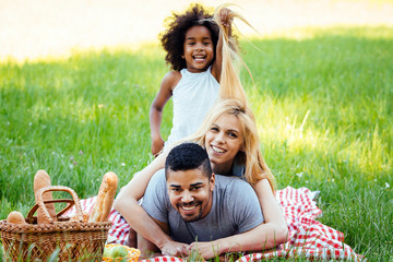 Wall Mural - Happy family having fun time on picnic