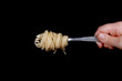 © arybickii - Ready spaghetti on a fork in hand