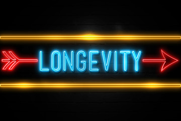 Wall Mural - Longevity  - fluorescent Neon Sign on brickwall Front view