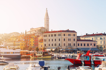 Wall Mural - Sunset at medieval town of Rovinj, colorful with houses and church,harbor