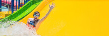 BANNER Father And Son On A Water Slide In The Water Park Long Format