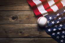 Baseball With American Flag In The Background