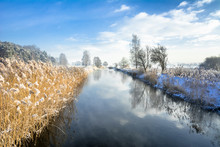 Landscape Of River In Spring Thaws Or In Late Winter