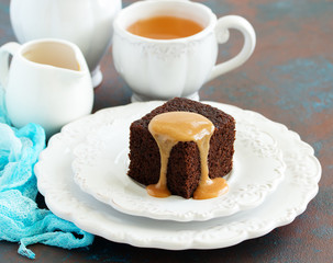 Wall Mural - Sticky date pudding with caramel sauce.