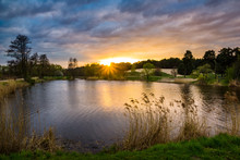 Sunset Over Pond In Zalesie Dolne, Poland