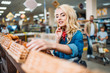 © LIGHTFIELD STUDIOS - woman in shopping supermarket