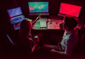 Wall Mural - Couple working at night