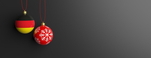 Germany flag on a christmas ball, black background. 3d illustration