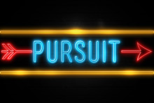 Pursuit  - Fluorescent Neon Sign On Brickwall Front View