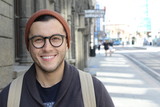 Fototapeta  - Cute hipster smiling outdoors close up