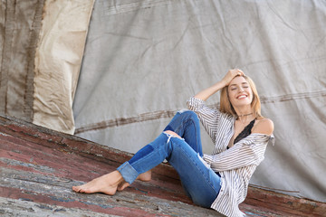 Wall Mural - Fashionable young woman outdoors