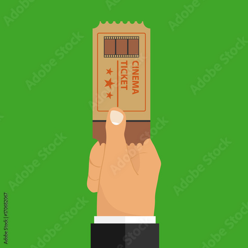 Fotografie, Obraz A hand holds a movie ticket, a retro movie ticket