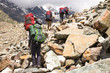 © lkoimages - Hiking in beautiful mountains. Group of hikers enjoy the weather