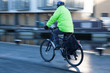 © Tony - Man cycling with safety helemnt and high visibility jacket
