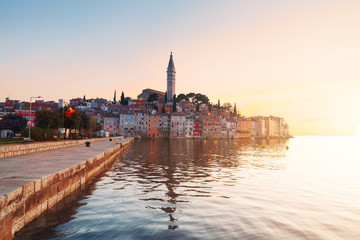 Wall Mural - Sunset at medieval town of Rovinj, colorful with houses and church