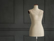 Vintage tailor's mannequin in elegant room with copy space