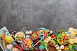 Assortment of colourful sweets with copy space