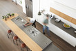 © Monkey Business - Overhead View Of Busy Couple In Modern Kitchen