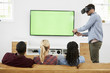 © Monkey Business - Friends Playing Computer Game With Virtual Reality Headset
