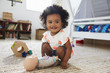 © Monkey Business - Cute Baby Girl Having Fun In Playroom With Toys