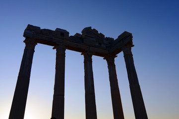 Temple of Apollo with a beautiful sunset background, in Side, Antalya, Turkey.