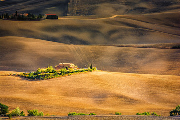 Beautiful rural landscape in Tuscany Italy with hills and meadow