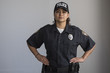 © Burlingham - Portrait of a Hispanic female police officer