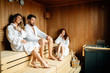 © NDABCREATIVITY - People relaxing in sauna
