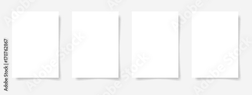 Fotomural four pieces blank A4 sheet of white paper with the shadow