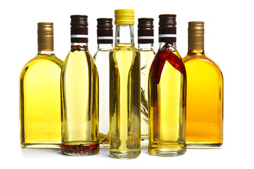 Wall Mural - Bottles of cooking oil, isolated on white