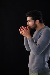 Wall Mural - Thoughtful man having a mug of coffee