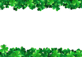 Saint Patricks day background with sprayed green clover leaves or shamrocks