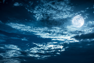 Wall Mural - beautiful night sky with dark cloudy. some clouds overshadow the full moon.