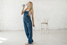 Pregnant Woman Drinks Fresh Bottle Water
