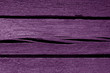 Old violet color weathered wood planks.