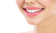 © Nobilior - Closeup shot of woman's smile with white healthy teeth, isolated on white background